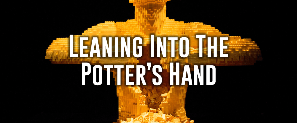 leaning into the potter's hand